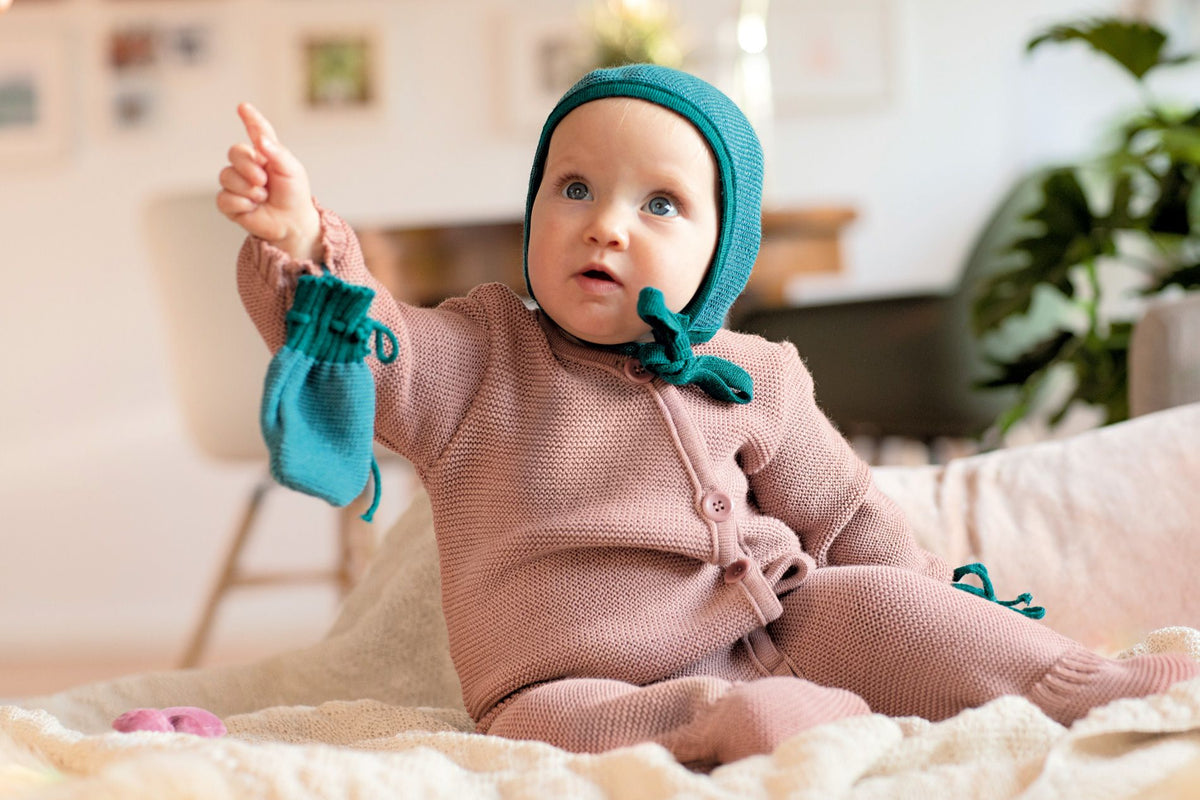 -20%: Woll-Strickhäubchen in Olive-Anthrazit Melange von Disana